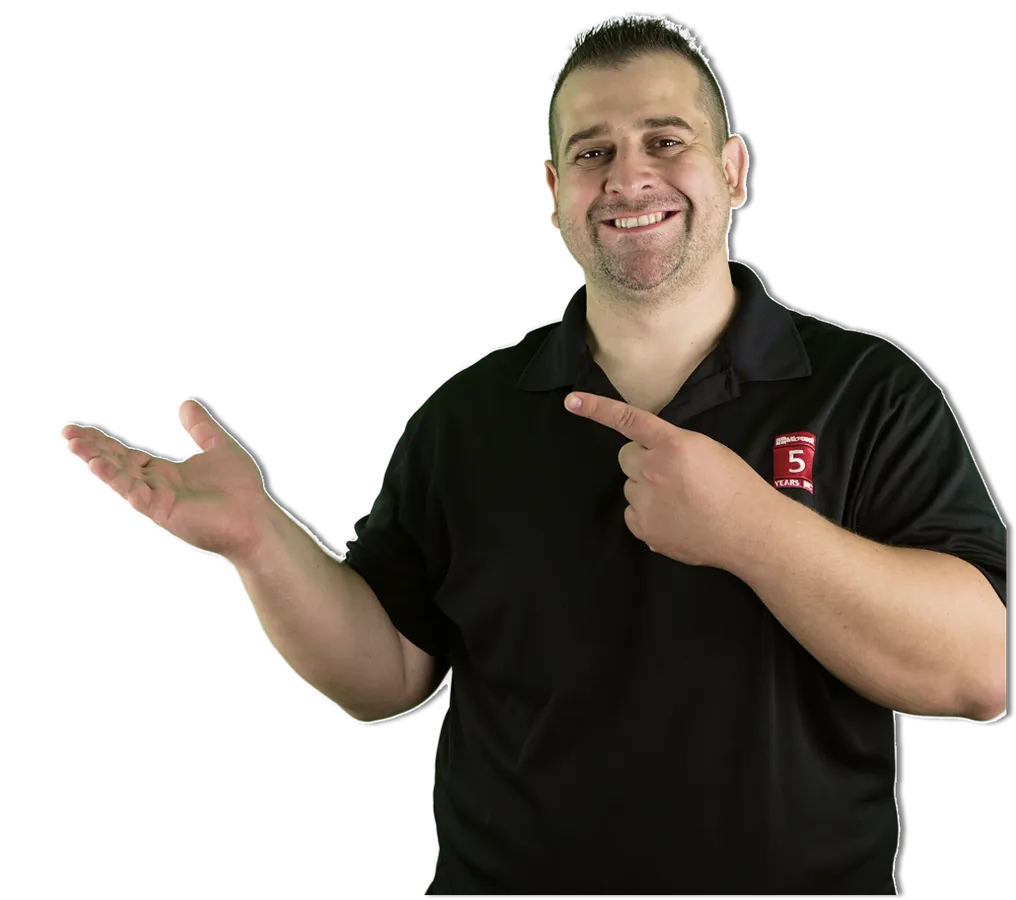 Vlad Catrinescu in a Pluralsight polo, pointing at the headline