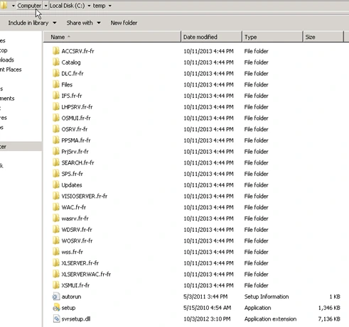 Windows Explorer view of C:\temp with the extracted SharePoint 2010 fr-fr language pack folders, the Updates folder, and the setup.exe installer