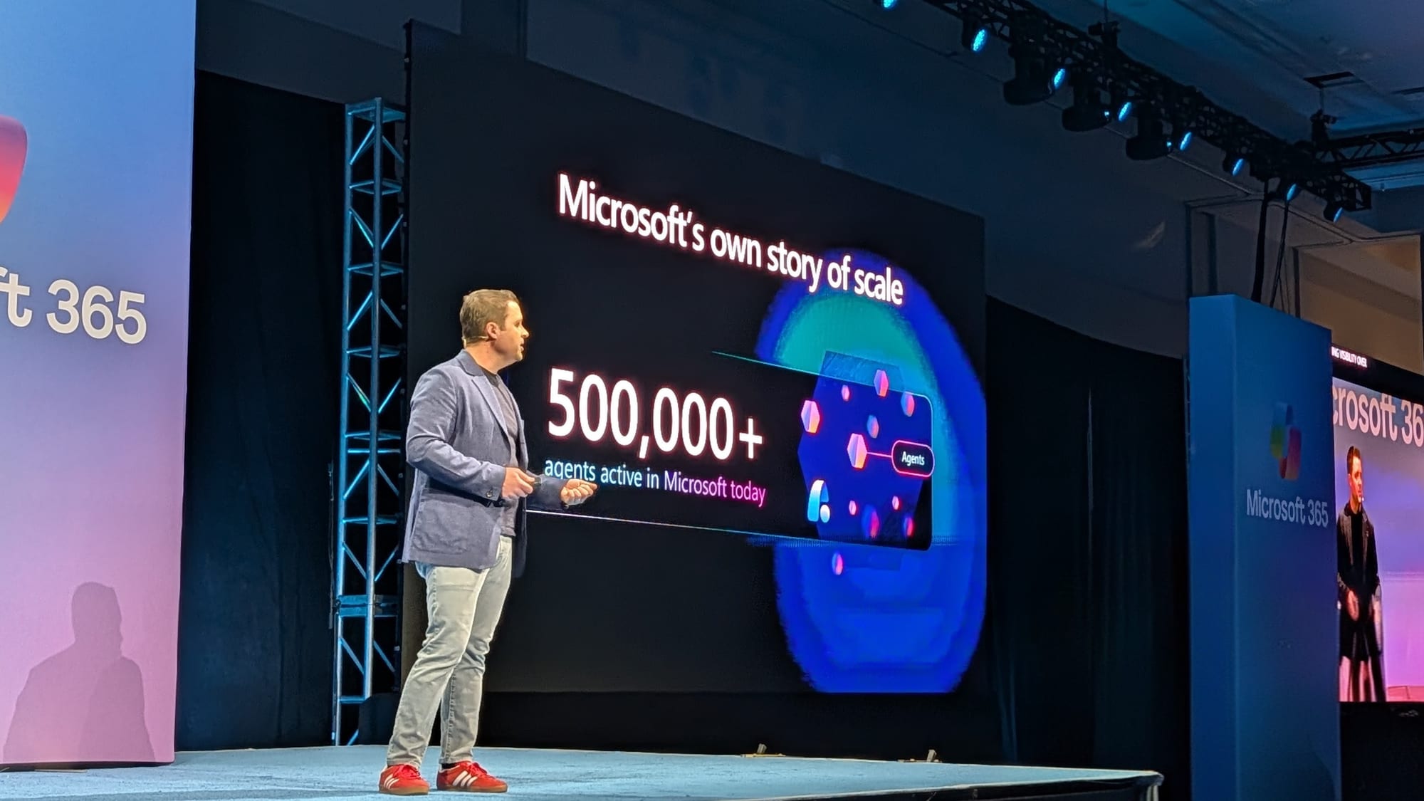 Ryan Cunningham on the Microsoft 365 Conference 2026 stage beside a slide reading 500,000+ agents active in Microsoft today