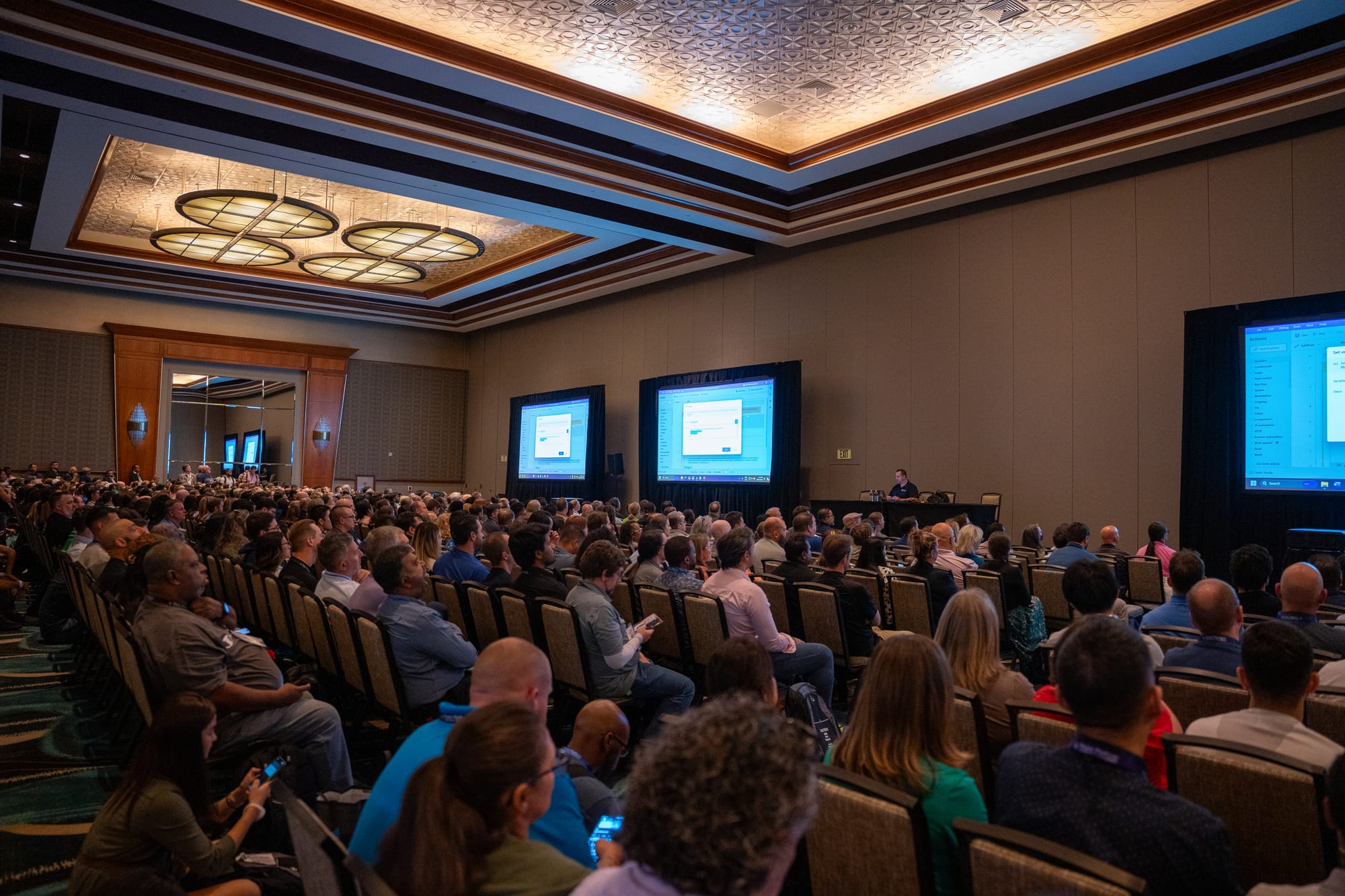 Packed ballroom watching Vlad present his session at the 2024 Power Platform Community Conference