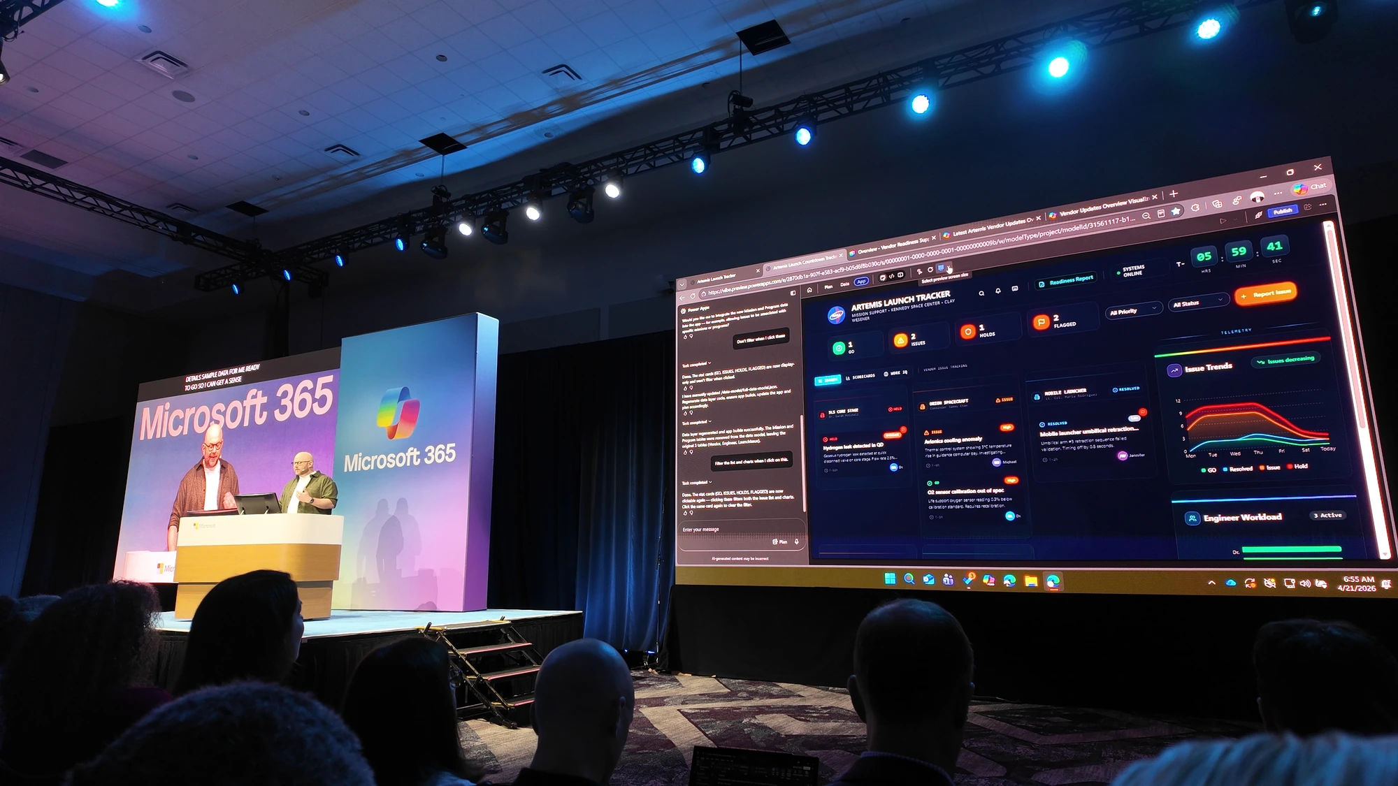 NASA Artemis Launch Tracker Power Platform app on the Microsoft 365 Conference 2026 keynote screen with two presenters at the podium